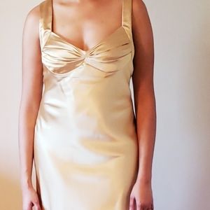 Gold cross back satin evening gown